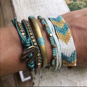 Hand beaded/stitched set of 5 bracelets.